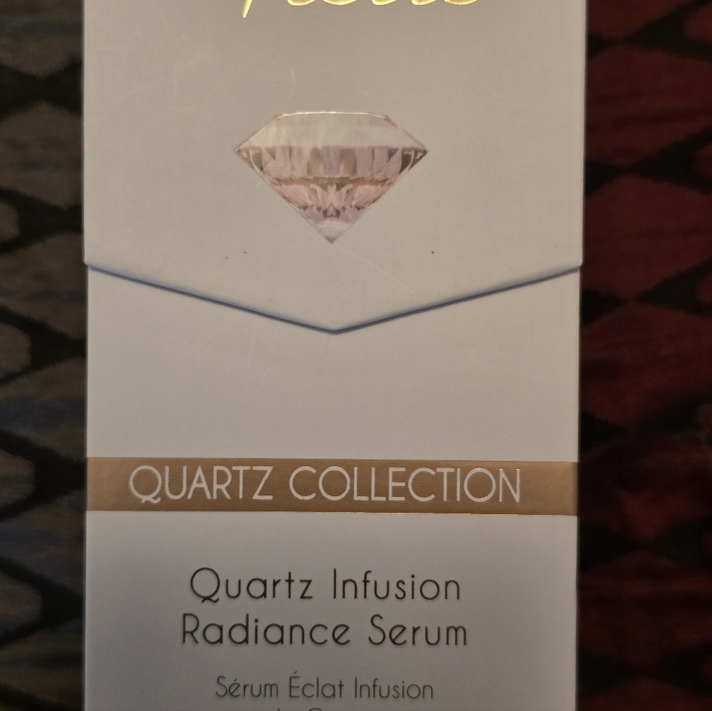 Luxury La Rouge Pierre Quartz Infusion Radiance Serum.